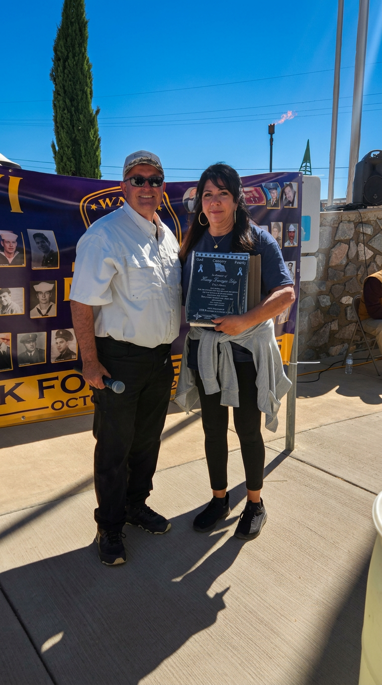 Family member receiving a personalized memorial plaque after the walk